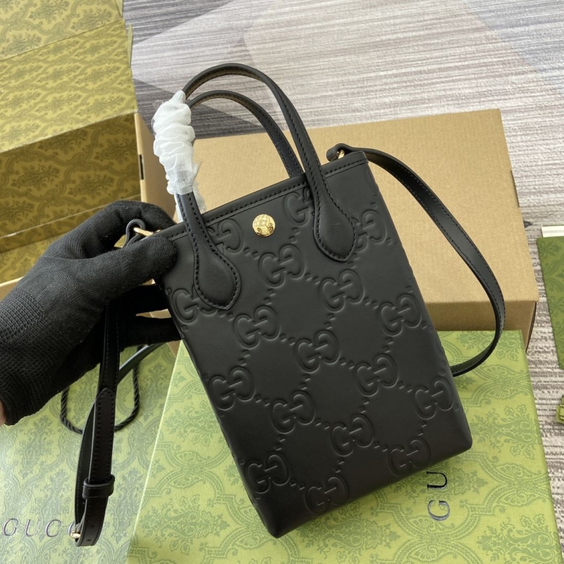 G*u*i top handle bags